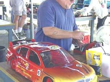 Me standing next to my 1:5th scale BMW Super Touring Car at the 2004 ROAR Region 12 1:5 Scale Championships.