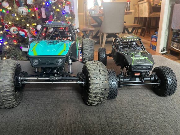 1/10 Capra is the kit with rtr panels (I wasn’t in the mood to paint). Big fella has a Spare Time Hobbies skid, OG Fusion 1800, Holmes SHV500V3 direct powered servo, 2.2” Proline beadlocks, old school JConcepts Rocx tires (5”), Treal brass outer portal weights (93g per side). She’s an absolute beast and the little fella is about to get stripped down and upgraded.