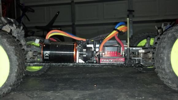 the stock motor lasted about a month (orion 2400kv), so we dropped in a 1/8th scale Turnigy motor with a SC speed controller....this baby shouldn't blink an eye at 3s and a 13t pinion....