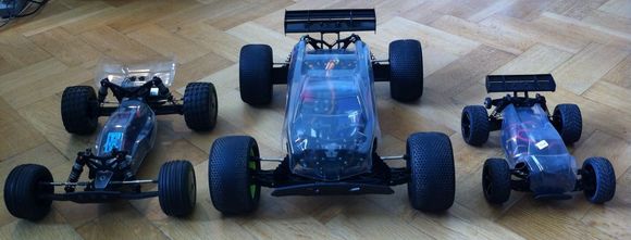 Left to right: 6S 22T dressed up as a buggy, 6S 8ight-T 2.5, 4S outrunner mini 8ight dressed up as a truggy