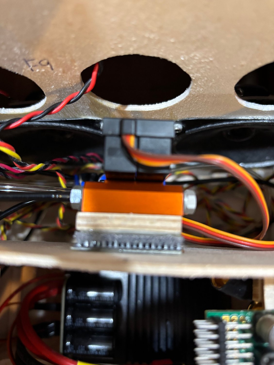 electronic air valve for gear doors mounted with velcro. the air fill valve and air pressure guage will go under nose hatch