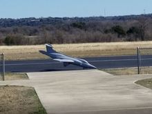 Wings level before impact, but significantly nose down.