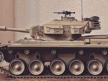 Basic tan, not weathered yet and some small “dry fitted” kit attached for test placement. 