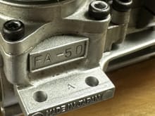"A" stamped on mounting lug