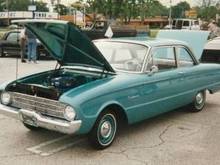 My first car, a 1960 Ford Falcon, same color as the one above. Three speed stick, I promptly installed a floor shifter by ?
