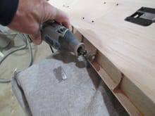 I'm using my Dremel tool to grind away the lions share of what's needed to be removed.