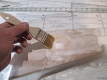 Apply the resin over your work piece.  Be generous applying the resin as it will soak into the wood.  Start from the center and work your way toward the edges.