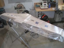 Fiberglass cloth was draped over the wing and trimmed.
