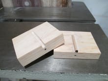 I thought I would show you how I made the cover plates that go over the trim tab control rod.  The process need not be fancy or complicated, I started off by making a male and female wooden die.  