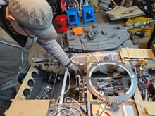 A scene where the completed gearbox is temporarily located in an existing burlap hole