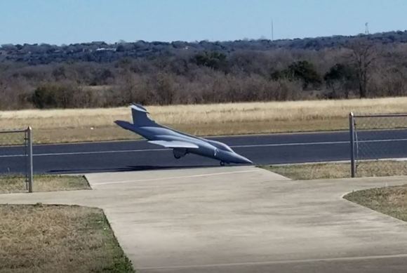 Wings level before impact, but significantly nose down.
