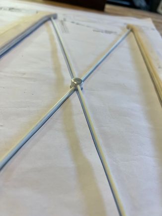 Just in case you want to know, the hole angle in the button is exactly 37 degrees.