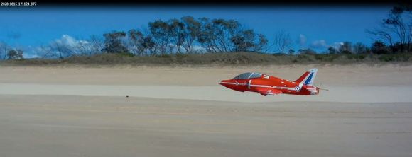 Zooming along the sand.