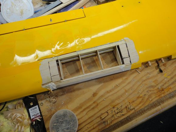 Removed the crunched wood Backed up the leading edge with 1"X1/4" .Put dubbers under the sheet made 4ea nose ribs and put oversized leading edge on back up. 
