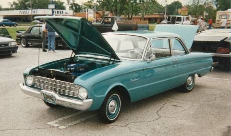My first car, a 1960 Ford Falcon, same color as the one above. Three speed stick, I promptly installed a floor shifter by ?
