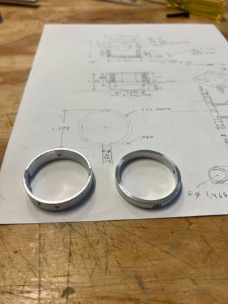 Ring on the left is the mount for the timing sensor and mounts to crankcase.  Ring on the right mounts to prop hub and has the magnet mounted in it.