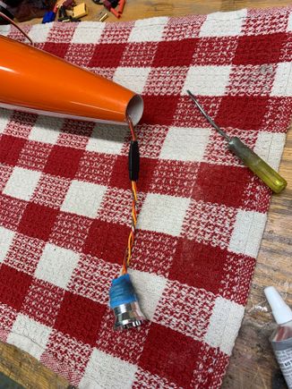 glued the CC voltage regulator about 3" inside the opening and left the extension loose.  Connector is easy to get at if ever needed.