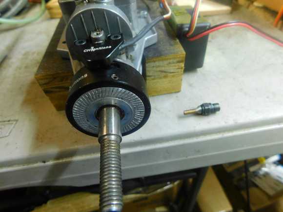 The modified glow plug is connected to a vacuum pump that holds the piston TDC while I bolt on the degree wheel.