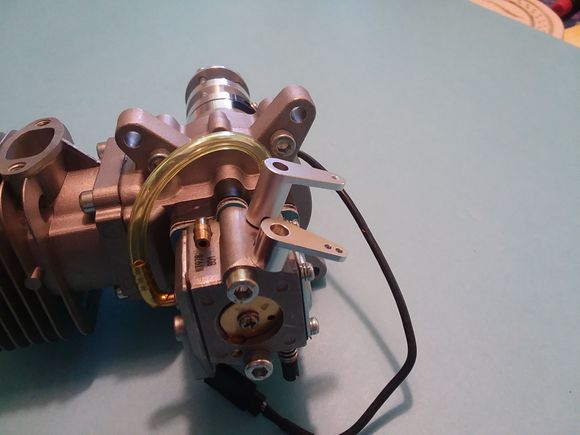 EZ to get to and attach a servo to the Choke & the throttle on a Walbro Carb with not drilling needed.