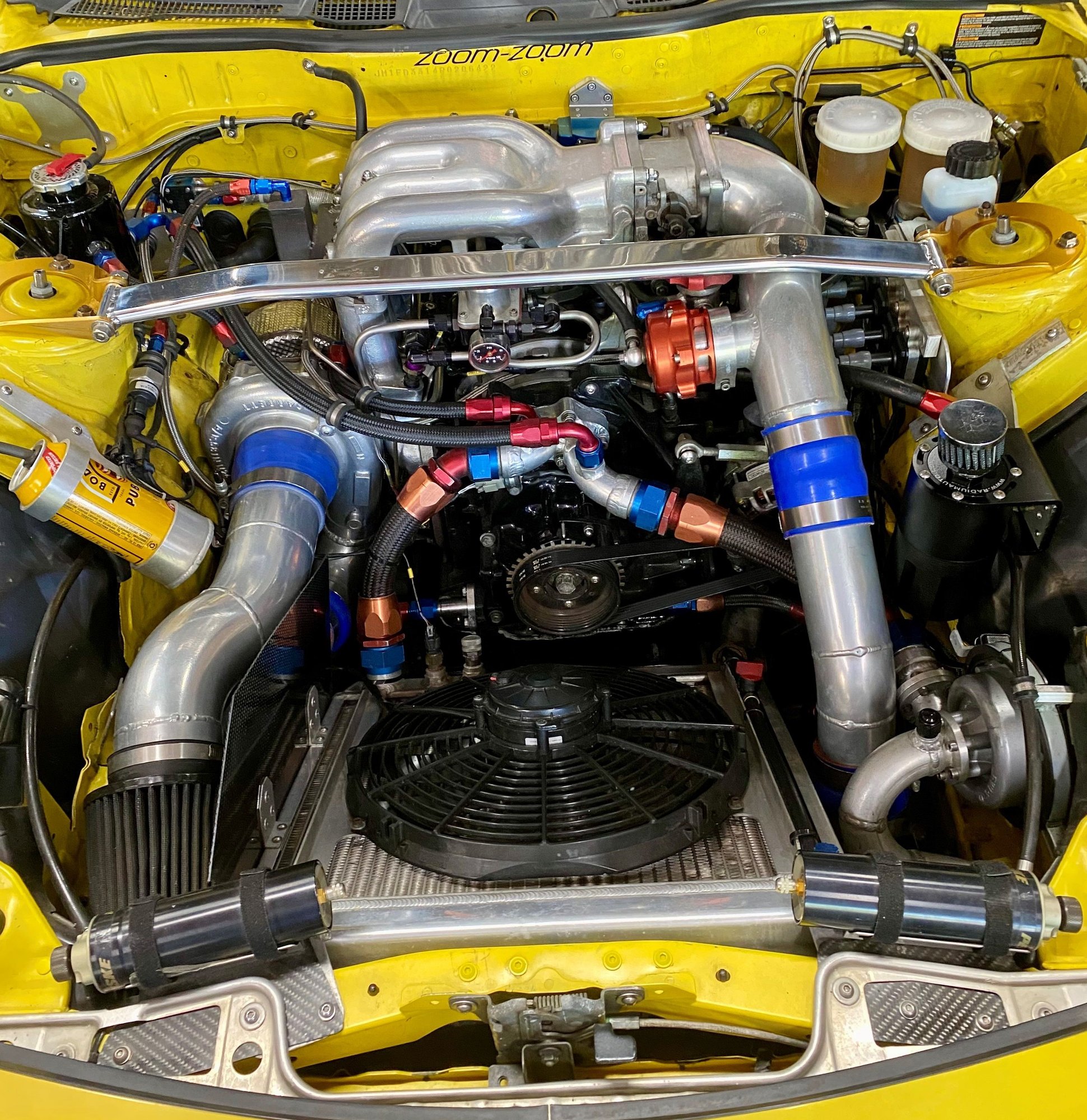 Nissan Sentra coils under driver-side strut brace