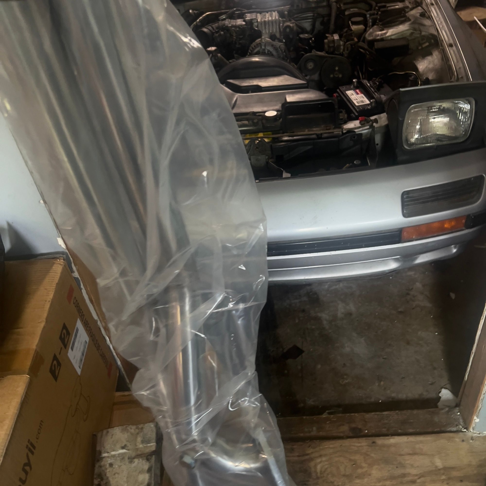 Guess what came in the mail!!??! A new downpipe and hopefully something to take the flames farther from my engine bay this time hah