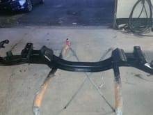 Here is the subframe and control arms with a fresh coat of semi gloss black paint