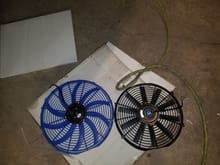 Craaazzzy, these are the fans i have left, the blue one is 16 inches at the ends of the cove,and the black one ,which came with the radiator, is 13 inches at the ends,if you need one ,let me lnow