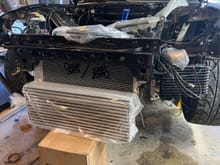 Garret intercooler core. Just sitting on a box. It will be raised up and mounted to the front cross member, will have cast end tanks, with back door inlet and outlet that goe under the frame rails just to the sides of the radiator and then curve into the engine bay. 