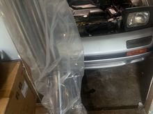 Guess what came in the mail!!??! A new downpipe and hopefully something to take the flames farther from my engine bay this time hah