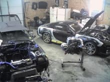 Asshole's Garage. The 3rd gen has a HX50 w/ a half bridge, and yes thats a Cosmo w/ a 4088 hanging off it ready to go into the 2nd gen. We build our own motors. Phil has experience w/ all 3 gens, RX-8, and the RE in the pic. Let me know if you need a rebuild, he's very capable.