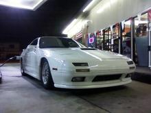 new gas station pic after an evening car wash. (finally slapped on the skirts and lip and resprayed the grill black)