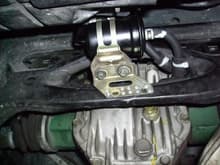 Oem fuel filter relocated to rear subframe with stainless steel pop rivets