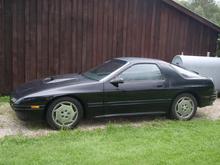 side view, note the fadded dull paint on the roof and hood.