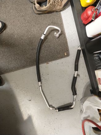 Here's the OEM suction side compressor hose & hard pipe assembly; hard pipe interferes with my turbo