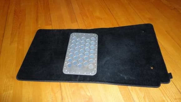 Custom made heel guard for driver's floor mat.