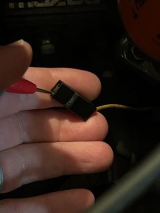 Positive lead of DMM to connector