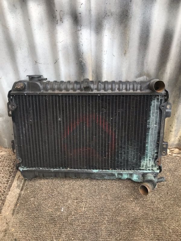 Old School Radiator to be reconditioned and brass recore.  Go the old school ways.  You learn from experience!