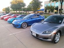 My '04 Titanium Grey 8 With a Winning Blue 8 and their older turbo relatives (The 2 RX-7's on the left.