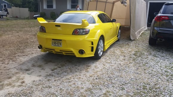 This was right after the paint job. it looks wierd and plain because I told them to just pain the whole thing yellow since they would charge me BS to put a little bit of black. so I let my cousin handle that