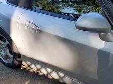 Scratches on the door from ice.