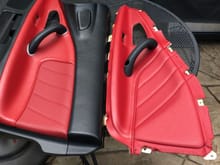04-05 AP2 red/black door panel compared to the 00-02 AP1 new pure red door card. 