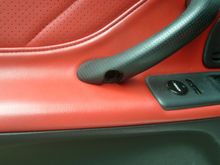 Missing driver side door handle trim plug.  A few bucks.