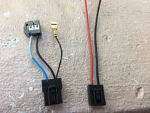 The stock wiring is on the left and the new plug is on the right.  The new plug has the gauge wiring.