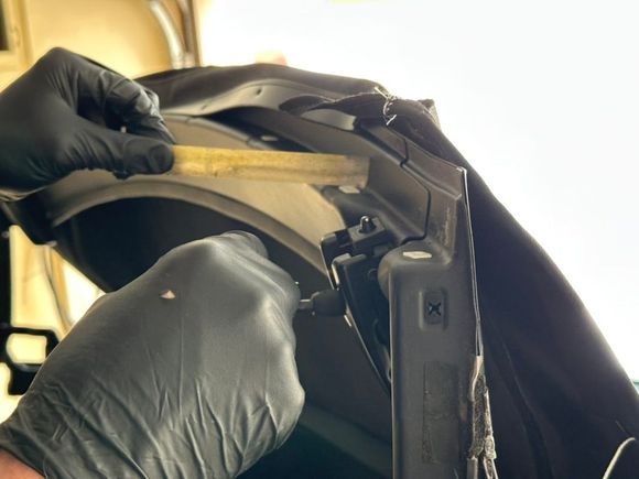 He removed the old trim tape and applied his own weatherproof adhesive to tack down the top. 