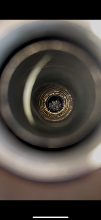 Here is inside the spark plug tube before I attempted to clear out the flooded fuel with the spark plugs out and injectors/fuel pump fuse unplugged 
