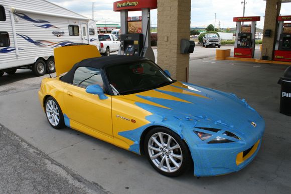 at a gas station gassing up (my spoon camo was not holding up too well)