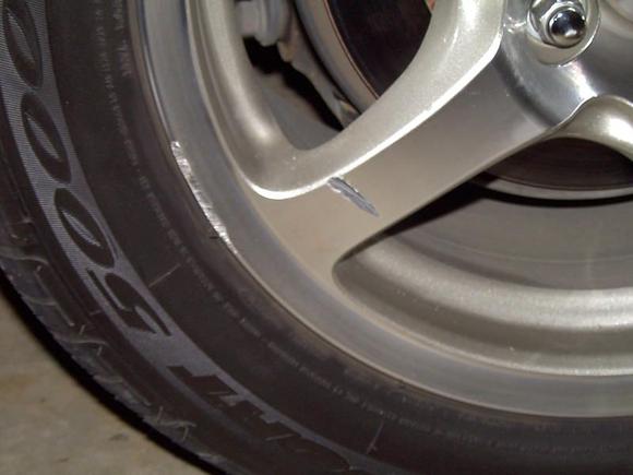 Gash &amp; Curb rash right rear