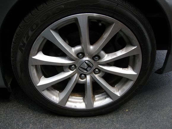 Dirty wheel, sitting in dealer lot for 6 months