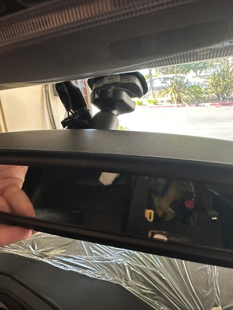 One day when I can figure out a way to get rid of the mirror button, I can use a universal mount. More adjustability, added functionality, and the cable is not as apparent. Any tips or tricks welcomed. 