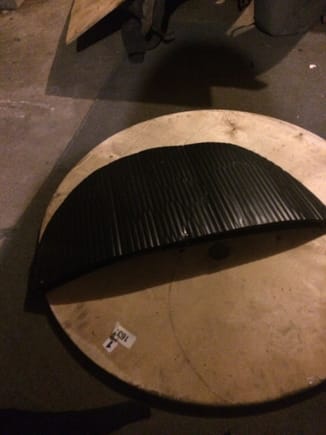 Rear wheel skirt panel for Saturn Ion, cut to proper chape to for the wheel well